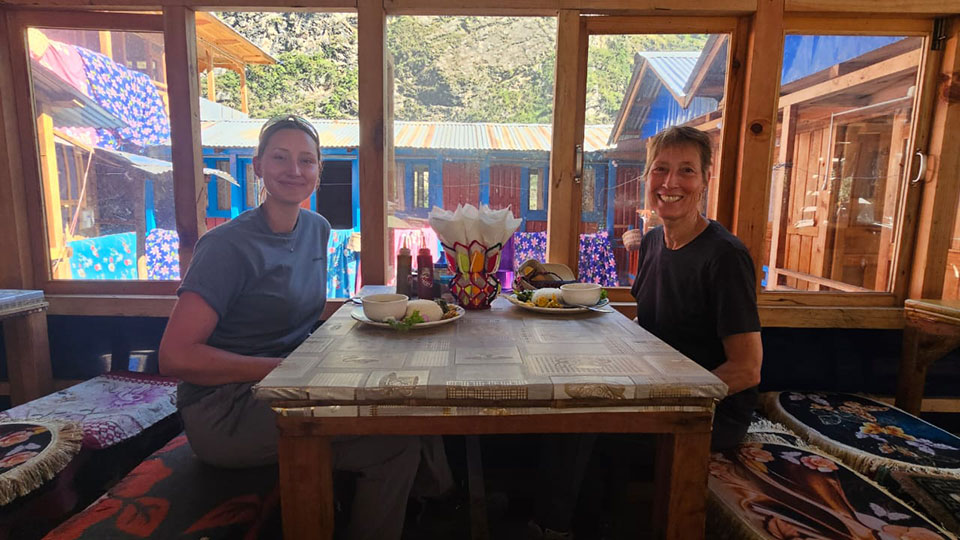 Enjoying lunch during the trek on the Manaslu Circuit.