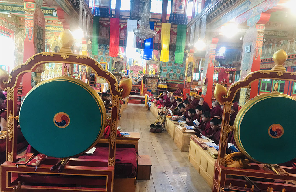 Buddhist Monks Chanting at Monastery.